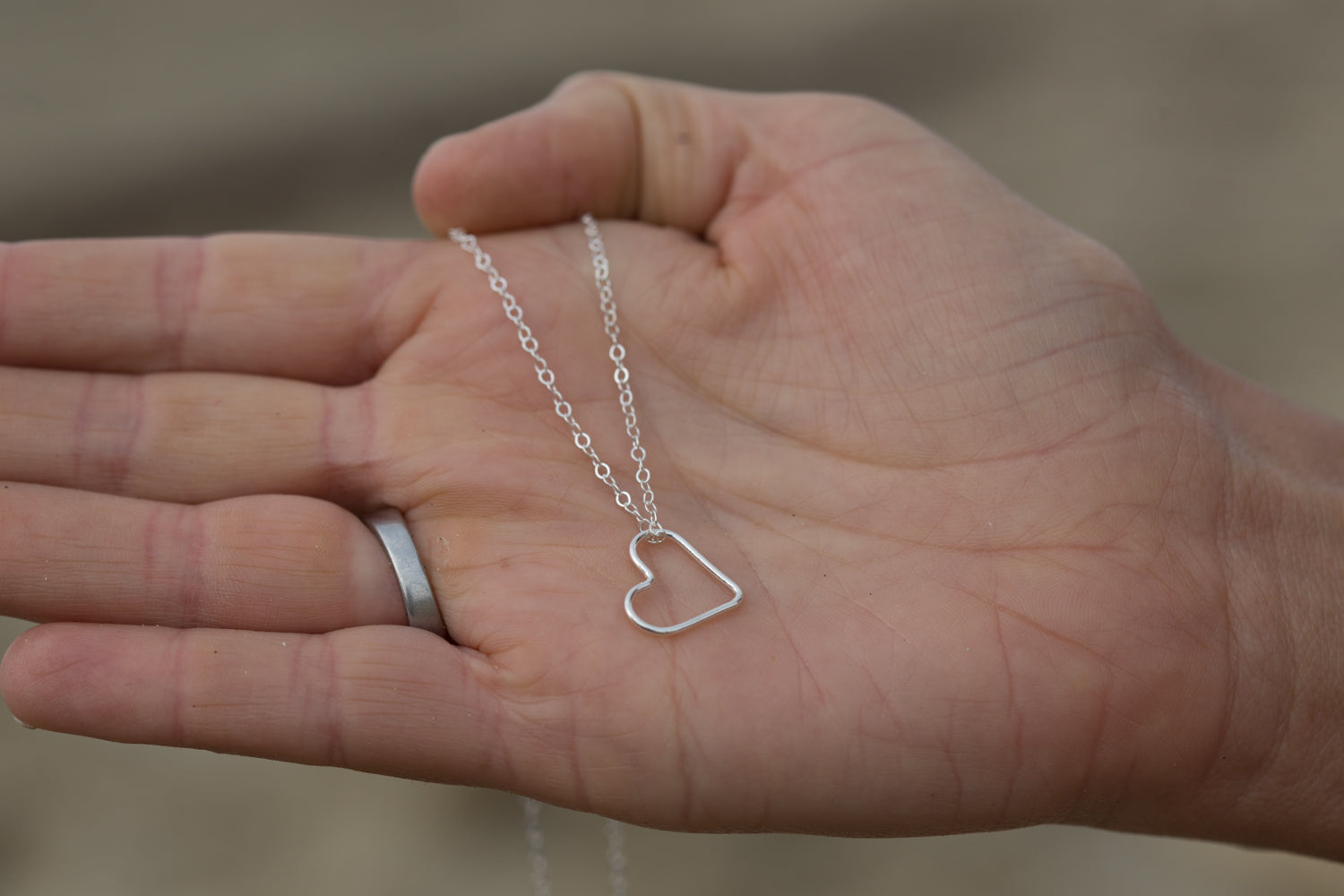 silver floating heart necklace
